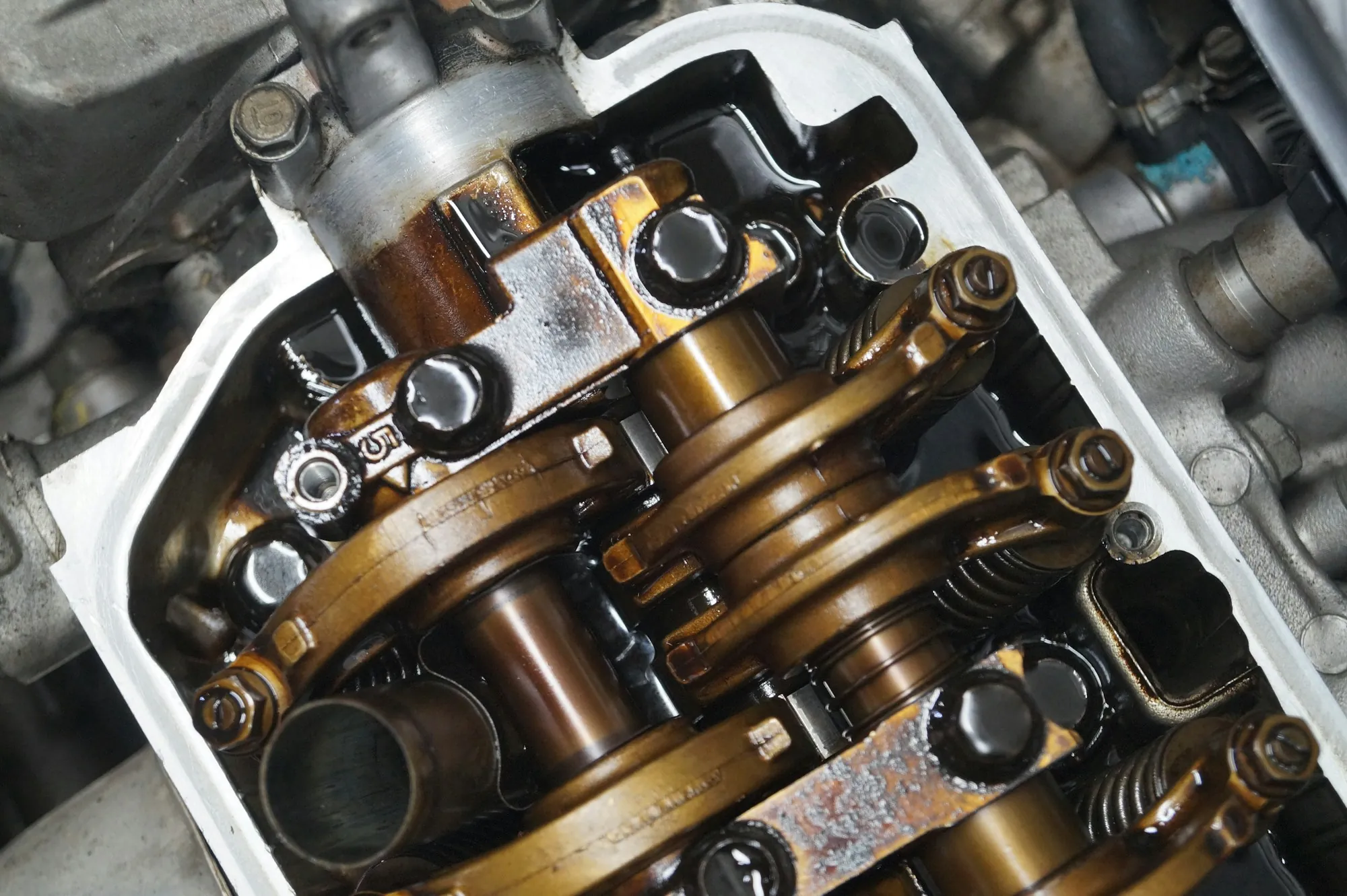 Close view of an engine's camshaft and valve train